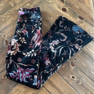 Women’s size small velvet floral stretchy bellbottom pants.